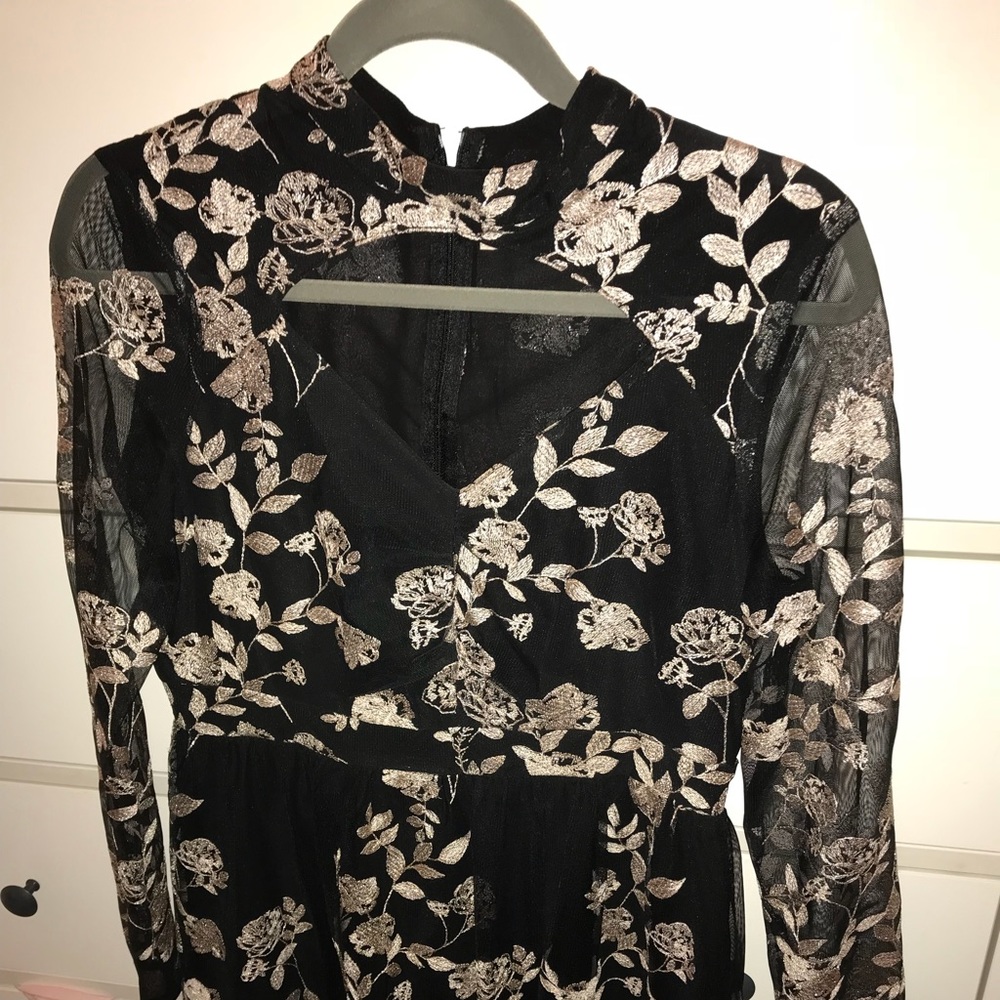Long-sleeve black and gold dress